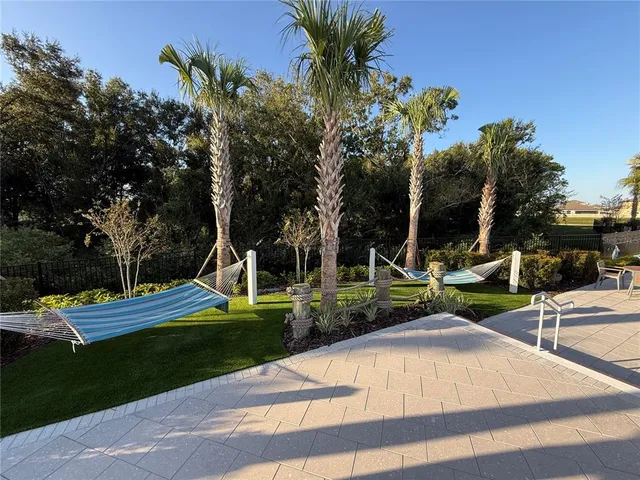 a room with gym equipment and a large window