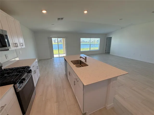 a view of a kitchen with a sink