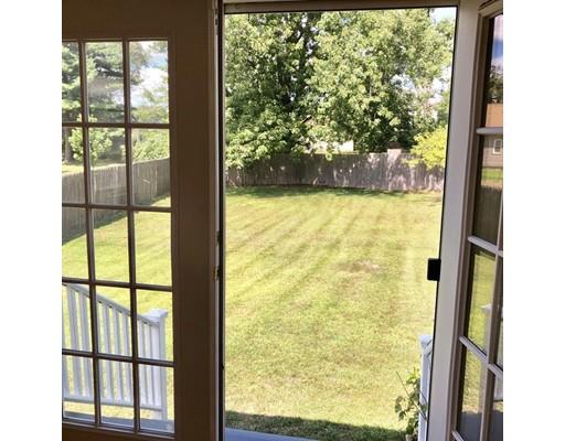 116 Gillette Circle Springfield, MA 01118 - Photo 6 of 19 a view of a glass door with a tree