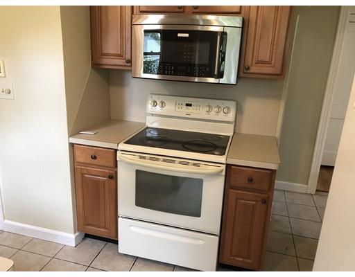 116 Gillette Circle Springfield, MA 01118 - Photo 8 of 19 a kitchen with a stove microwave and sink