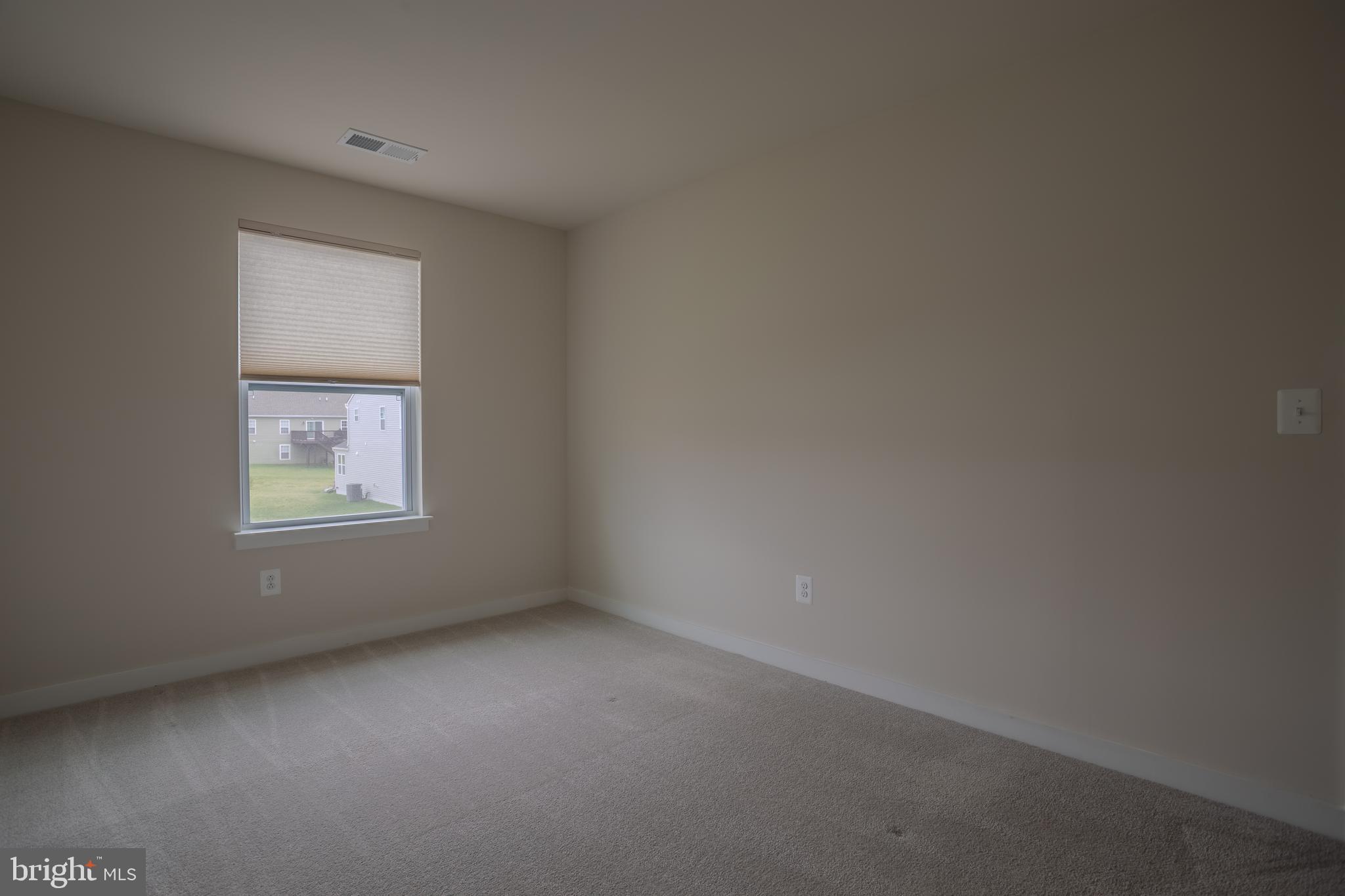 503 Boise Road Inwood, WV 25428 - Photo 42 of 83 a view of an empty room with a window