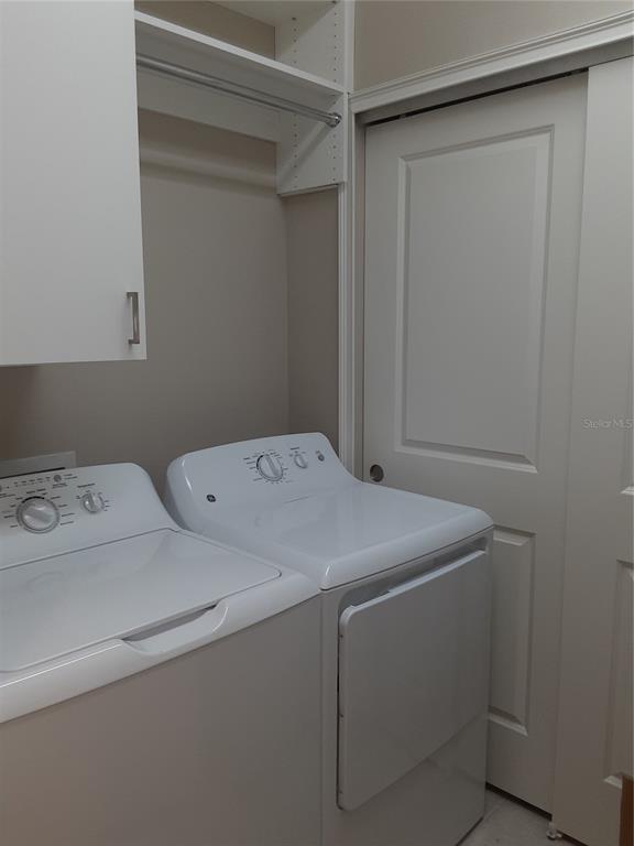 13605 Messina Loop, Unit 104 Bradenton, FL 34211 - Photo 24 of 38 a utility room with dryer and washer