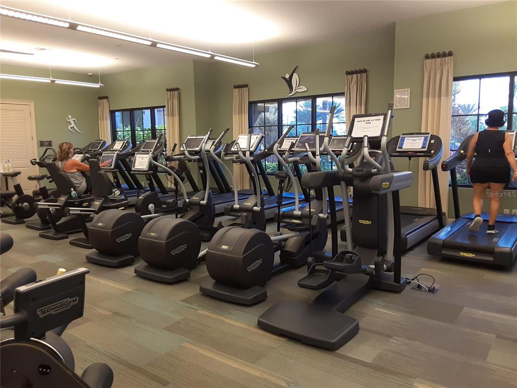 13605 Messina Loop, Unit 104 Bradenton, FL 34211 - Photo 30 of 38 a view of a room with gym equipment