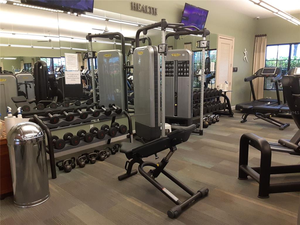 13605 Messina Loop, Unit 104 Bradenton, FL 34211 - Photo 31 of 38 a view of a room with gym equipment