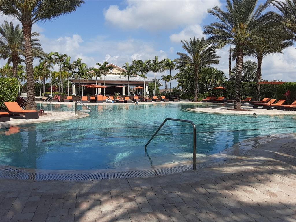 13605 Messina Loop, Unit 104 Bradenton, FL 34211 - Photo 33 of 38 a view of swimming pool with outdoor seating