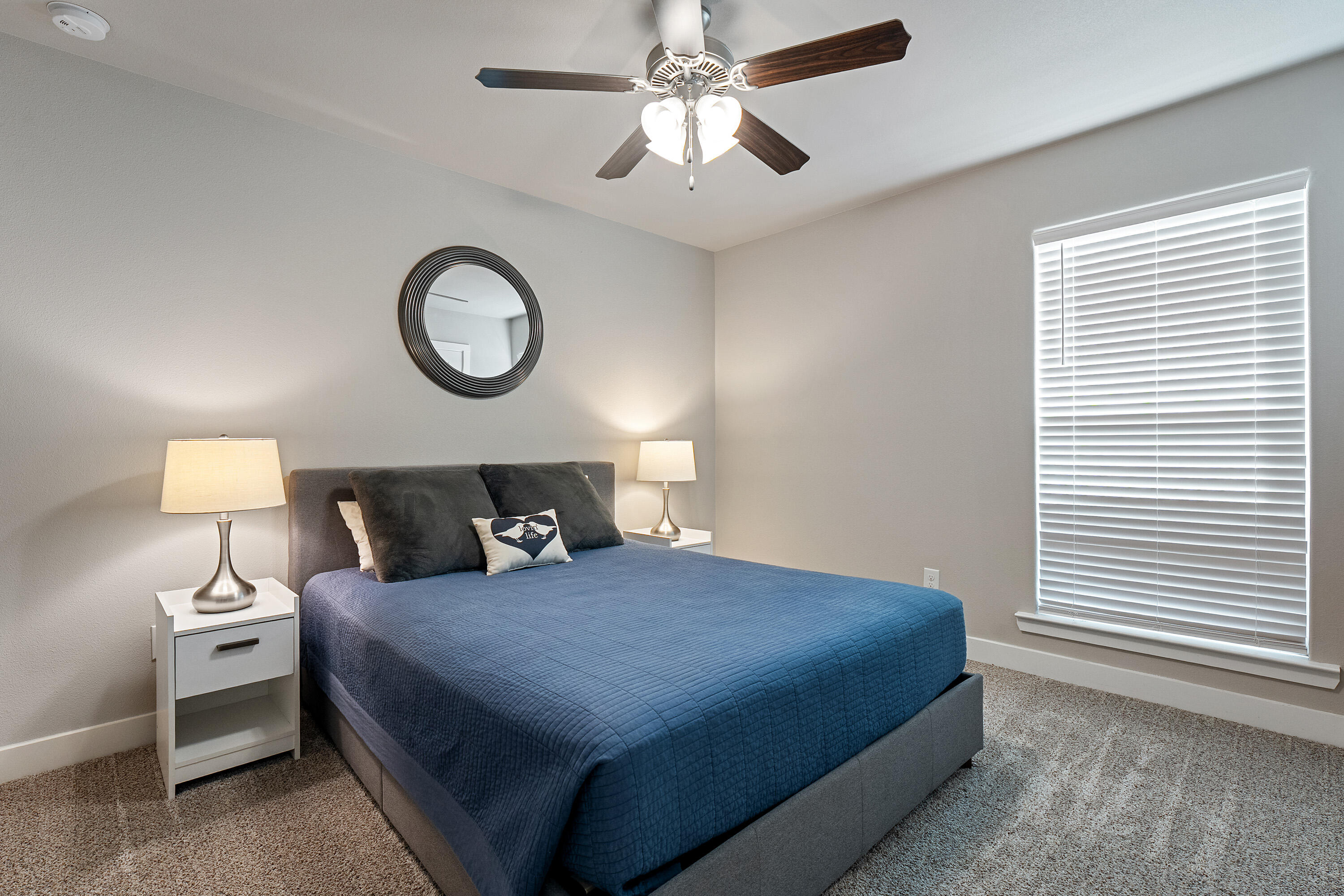 3103 Urbana Avenue Lubbock, TX 79407 - Photo 11 of 19 a bedroom with a bed and a window