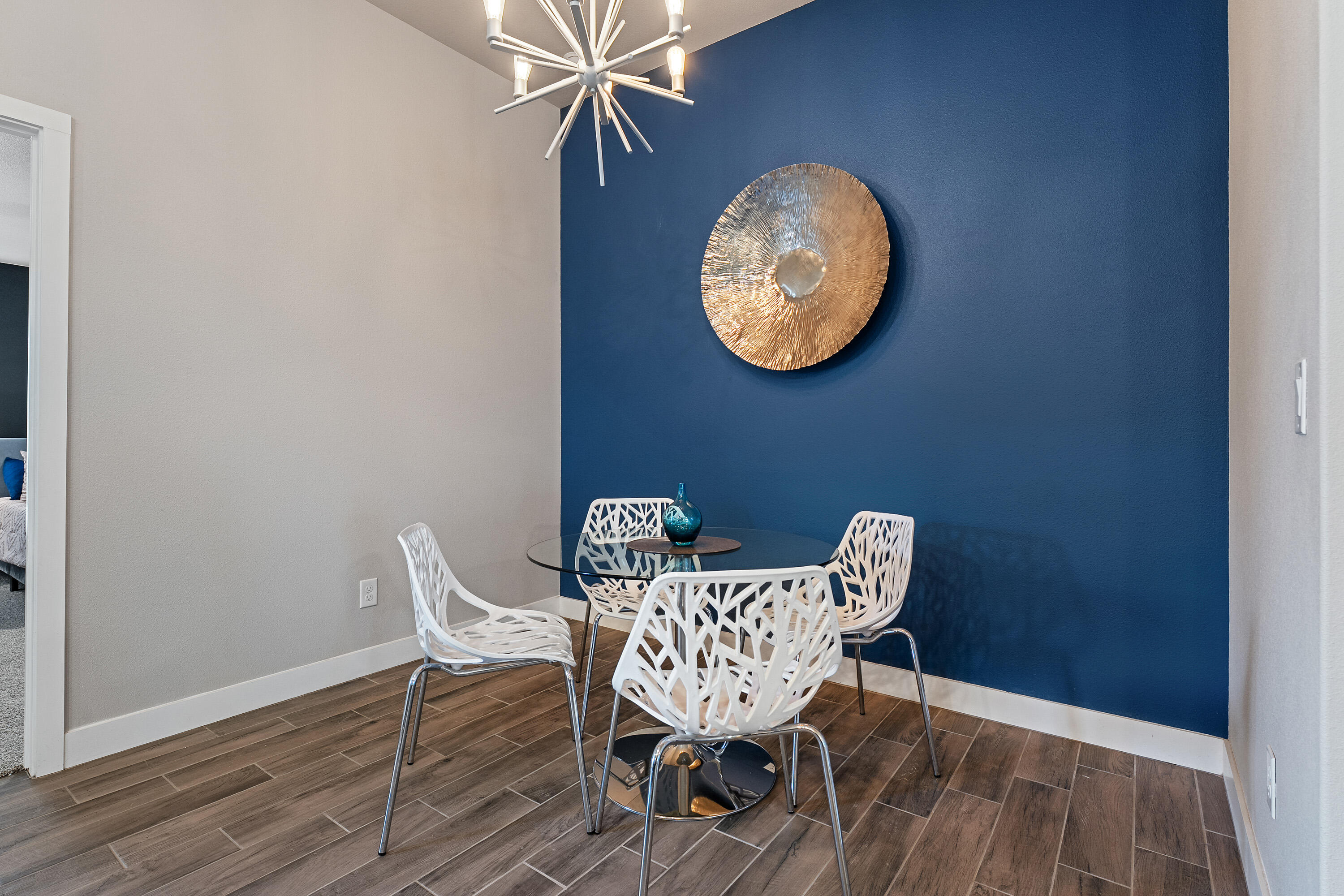 3103 Urbana Avenue Lubbock, TX 79407 - Photo 7 of 19 a view of a dining room with a table and chairs