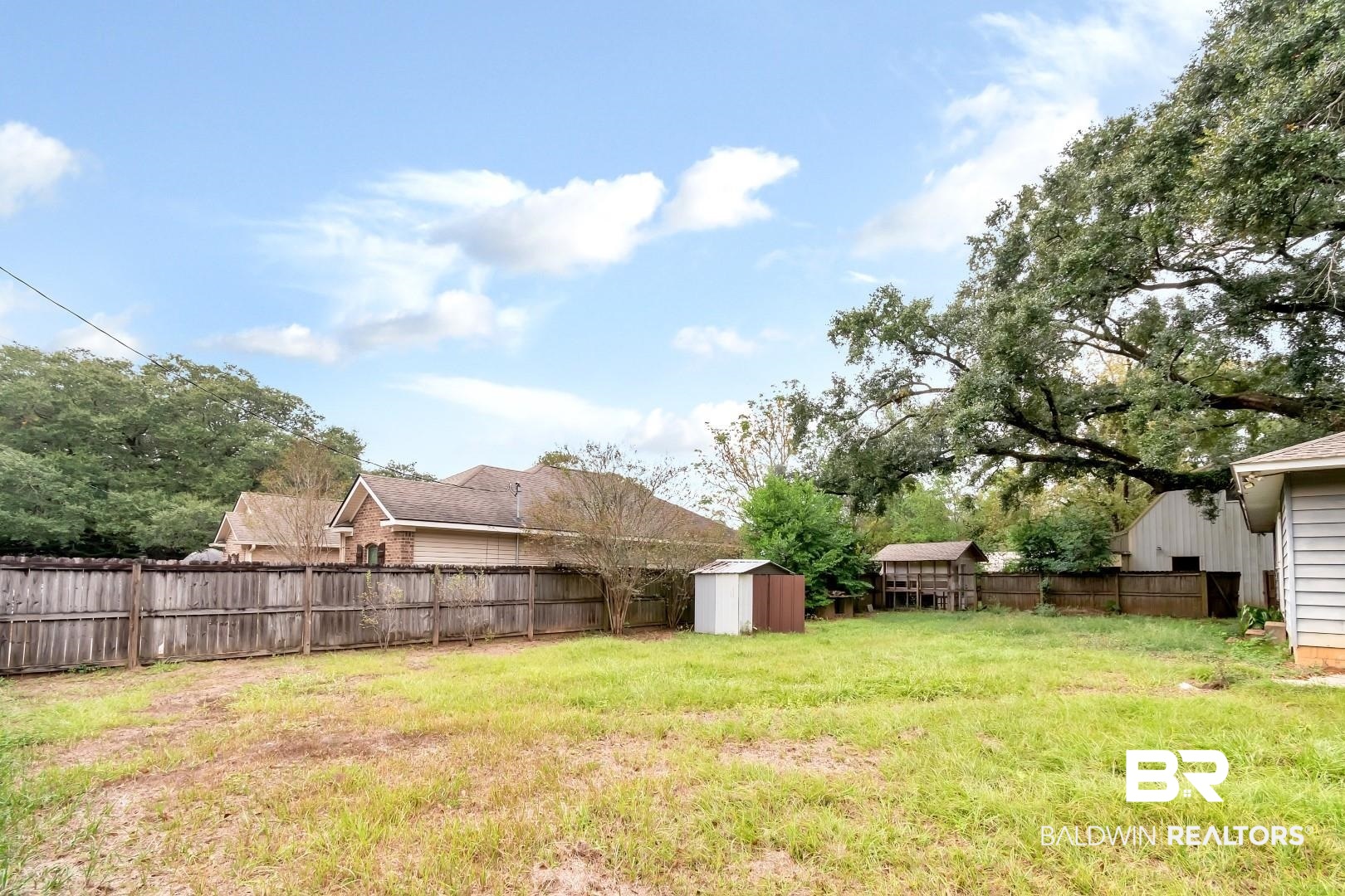 2762 Hillcrest Road Mobile, AL 36695 - Photo 20 of 25 View of yard with a storage shed