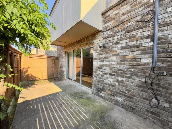 a backyard of a house with seating space