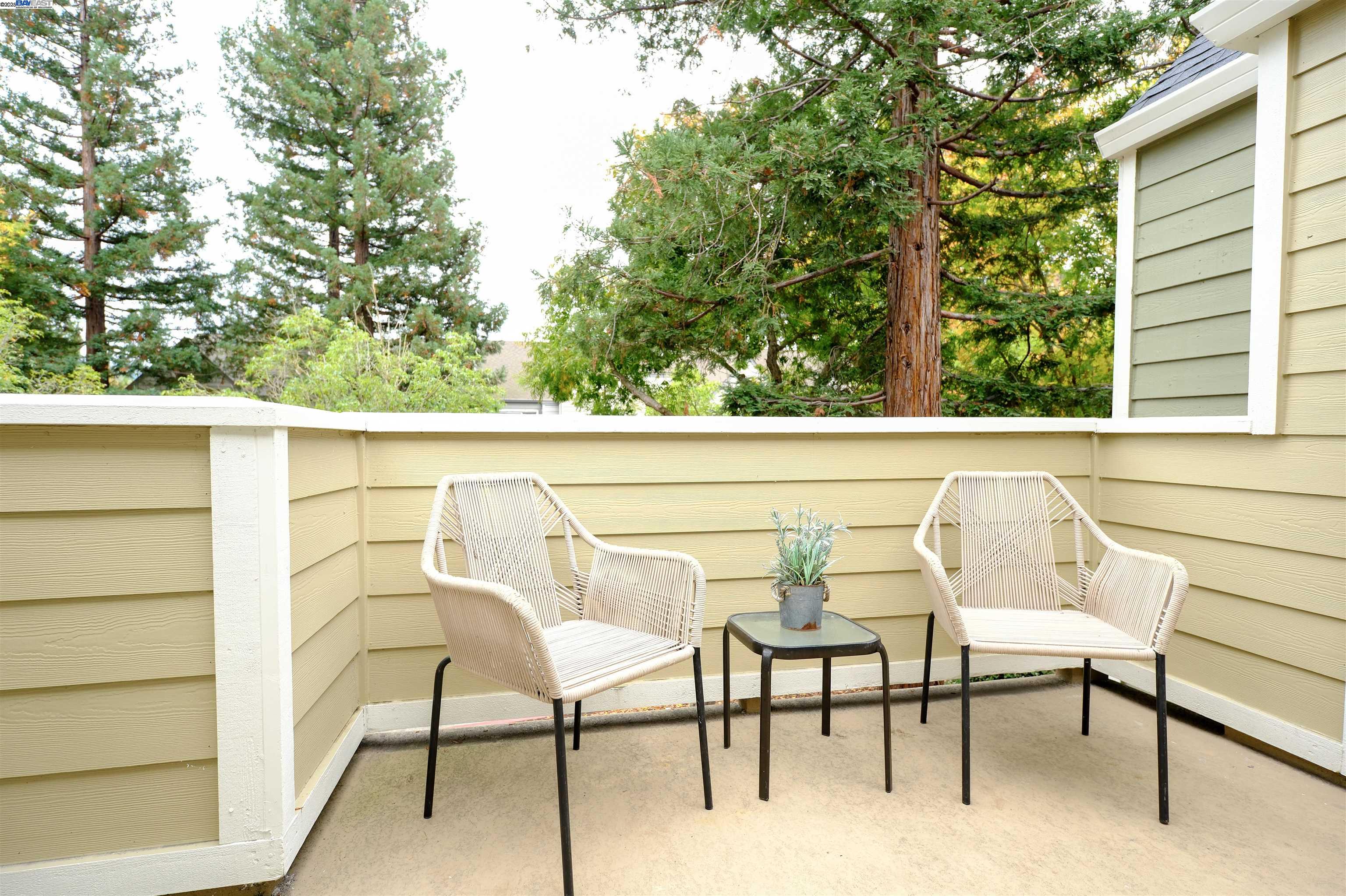 285 Reflections Drive, Unit 23 San Ramon, CA 94583 - Photo 21 of 33 a view of a chairs and table in a window
