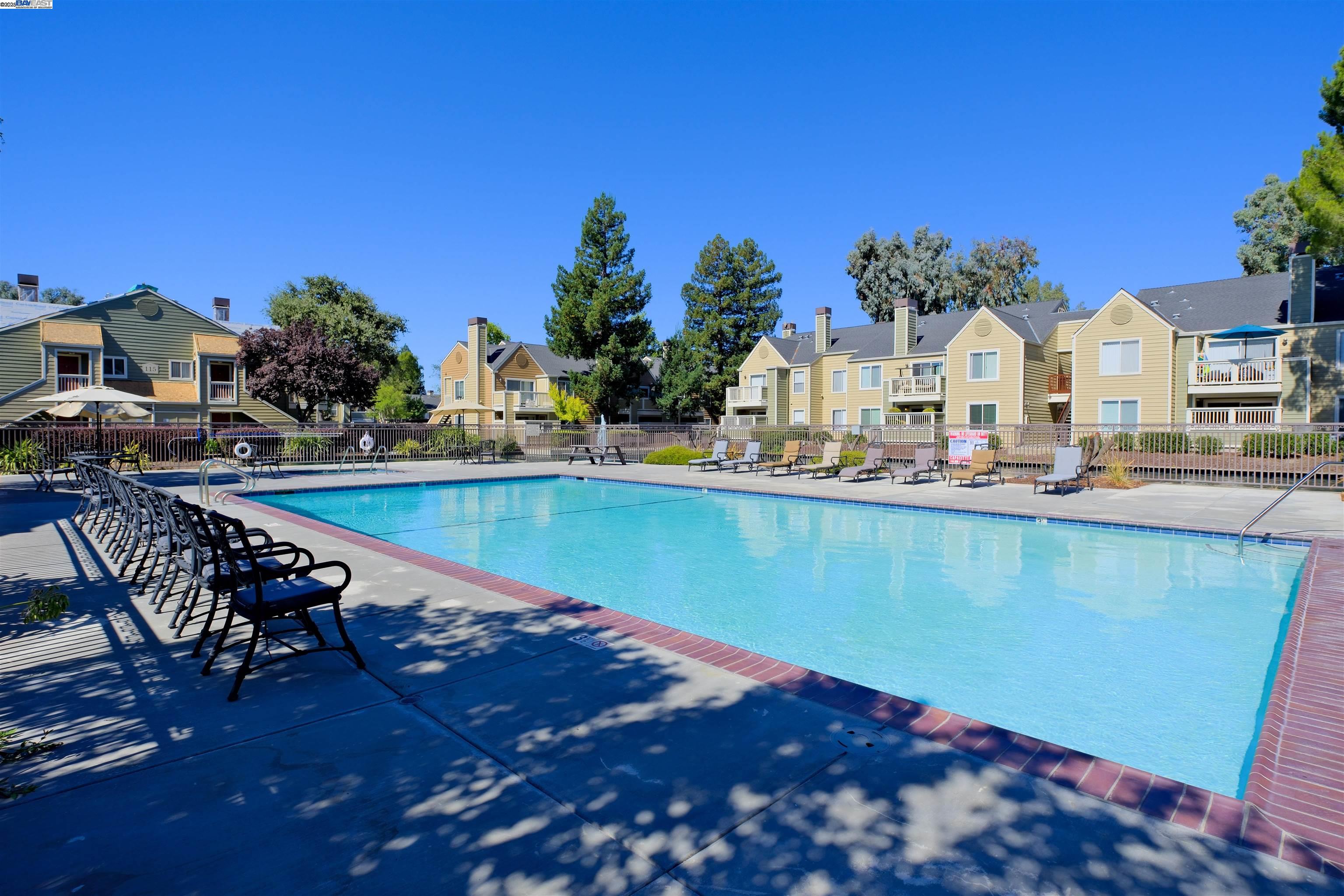 285 Reflections Drive, Unit 23 San Ramon, CA 94583 - Photo 28 of 33 a view of swimming pool with outdoor seating