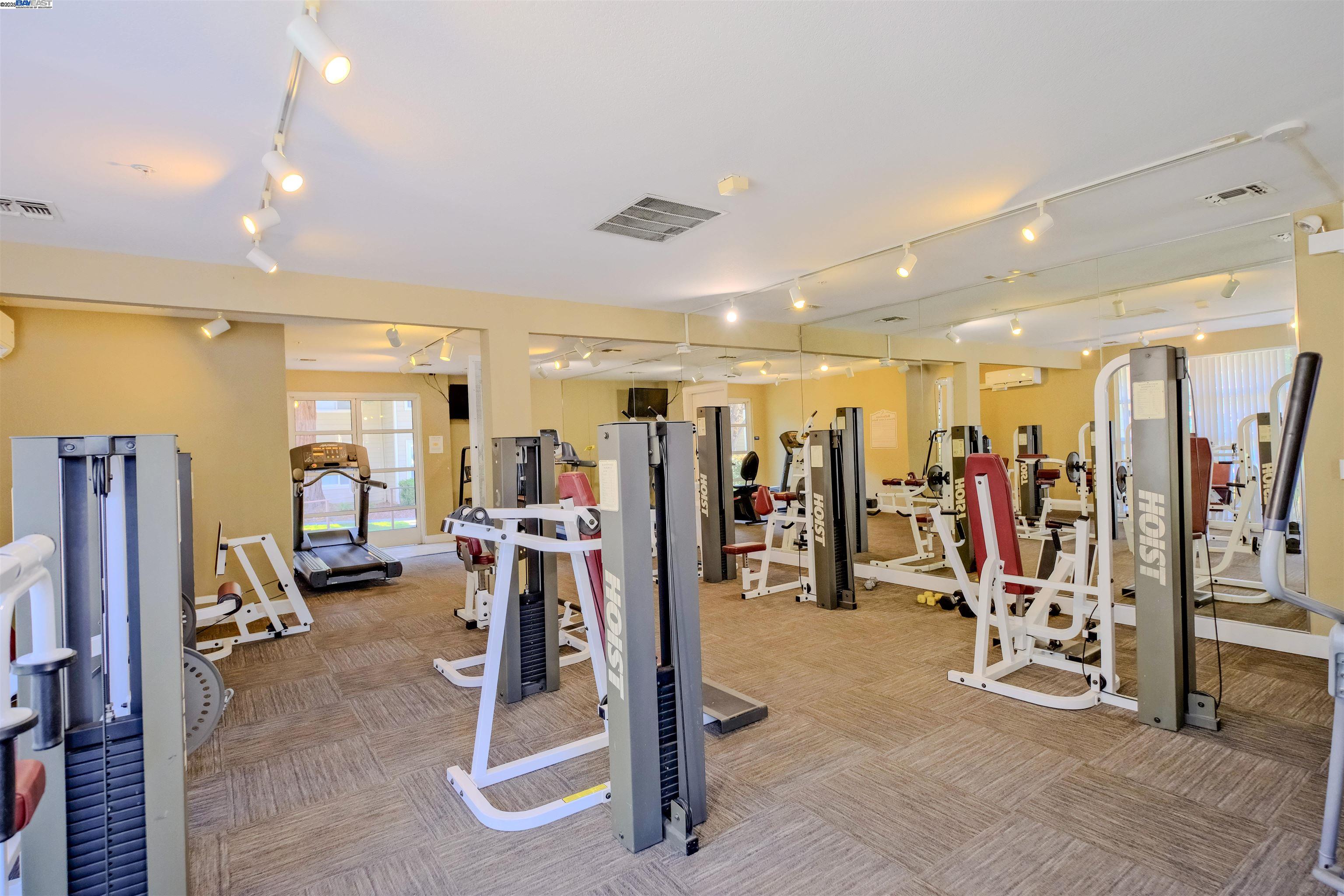 285 Reflections Drive, Unit 23 San Ramon, CA 94583 - Photo 31 of 33 a view of a room with gym equipment