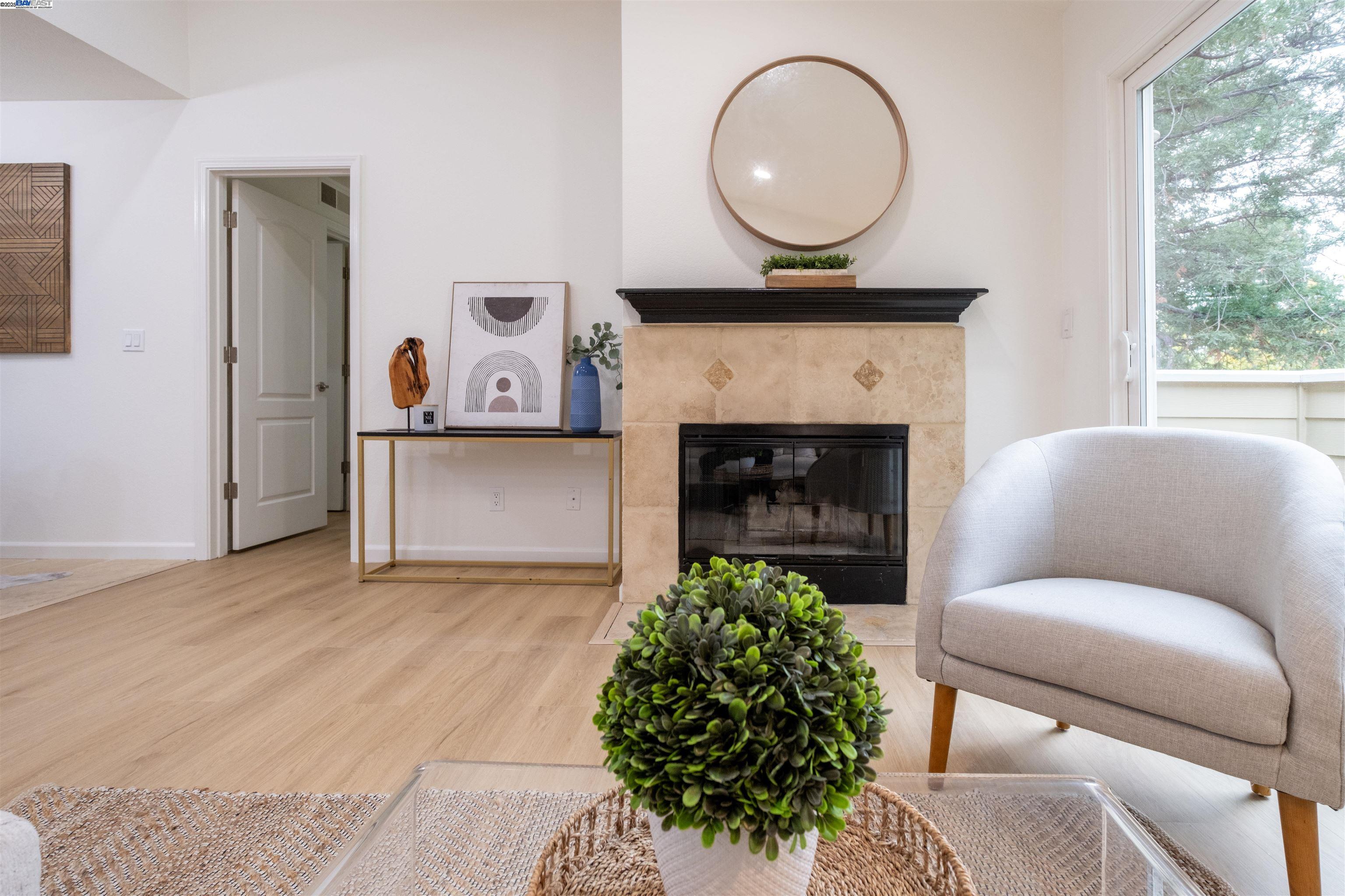 285 Reflections Drive, Unit 23 San Ramon, CA 94583 - Photo 5 of 33 a living room with furniture and a fireplace