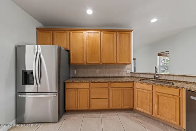 $565,000 | 1785 Windbrook Drive, Palm Bay, FL 32909