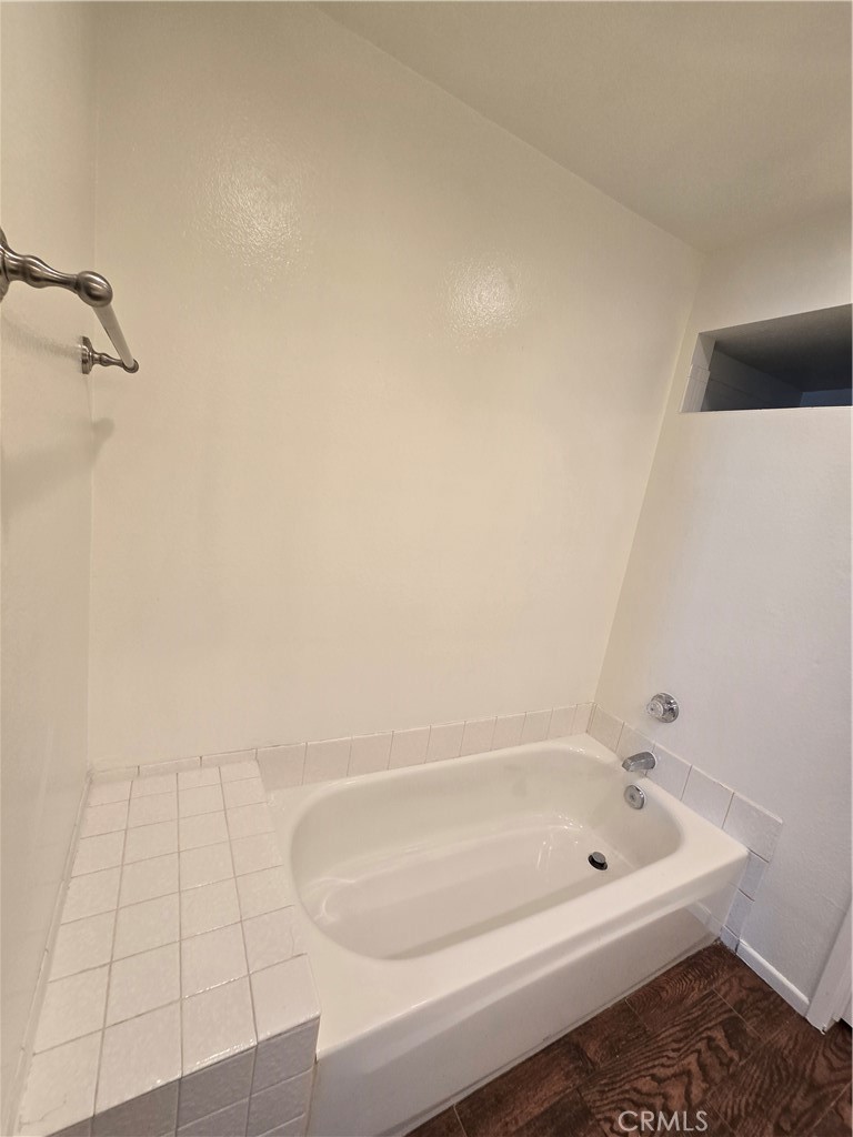 783 Grayling Costa Mesa, CA 92626 - Photo 17 of 25 a bathroom with a bathtub