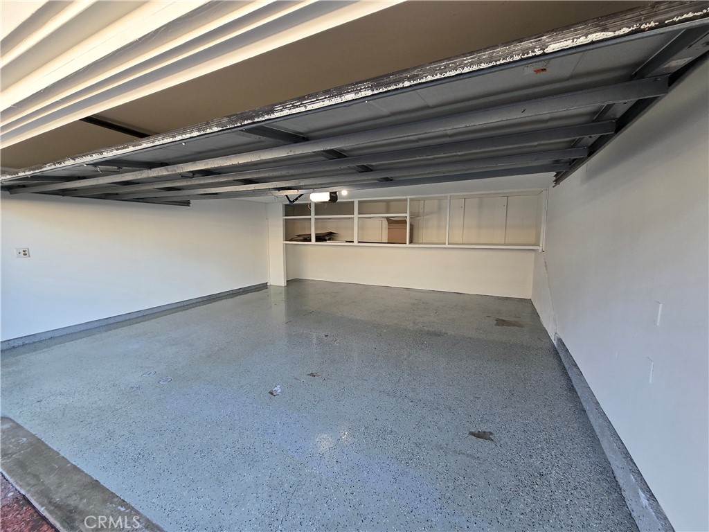 783 Grayling Costa Mesa, CA 92626 - Photo 25 of 25 a view of a room with racks on the wall