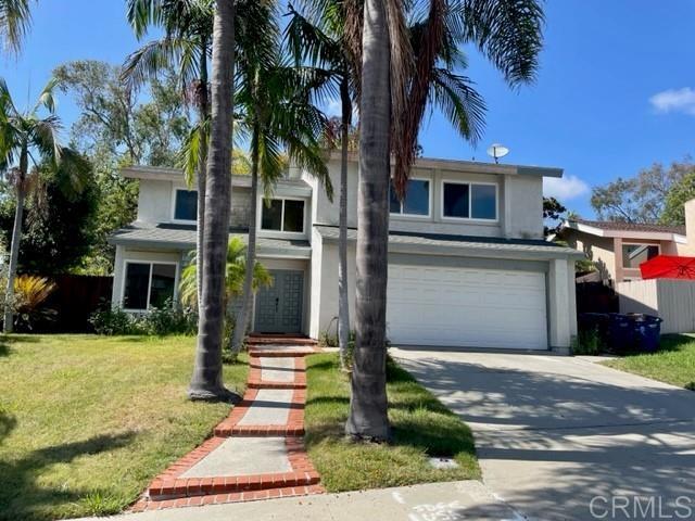 128 Little Oaks Road Encinitas, CA 92024 - Photo 1 of 1 a front view of house with yard and green space