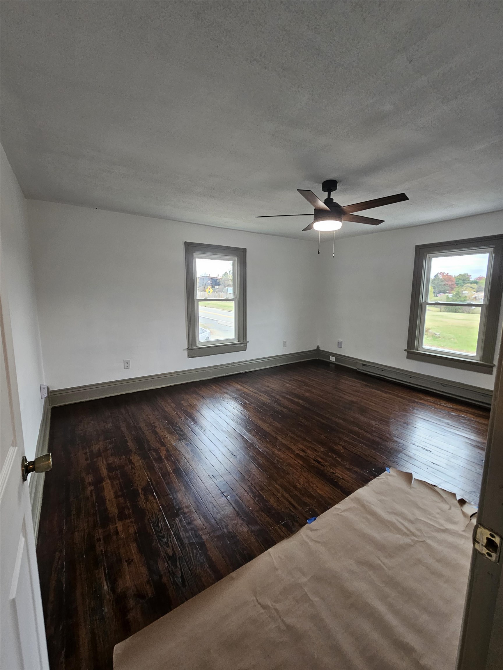 97 Mule Academy Road Fishersville, VA 22939 - Photo 12 of 15 wooden floor in an empty room with a window
