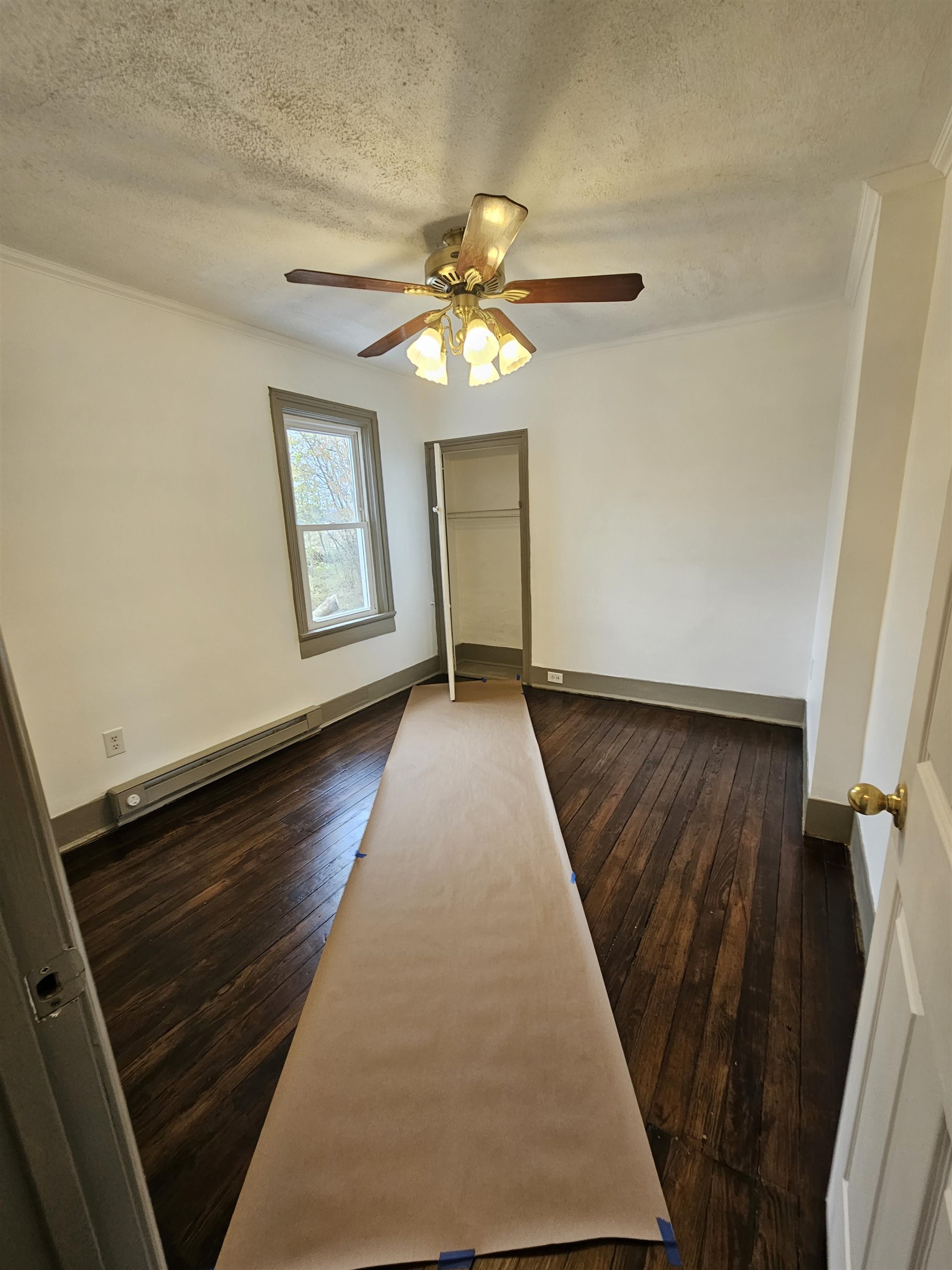 97 Mule Academy Road Fishersville, VA 22939 - Photo 13 of 15 wooden floor in an empty room with a window