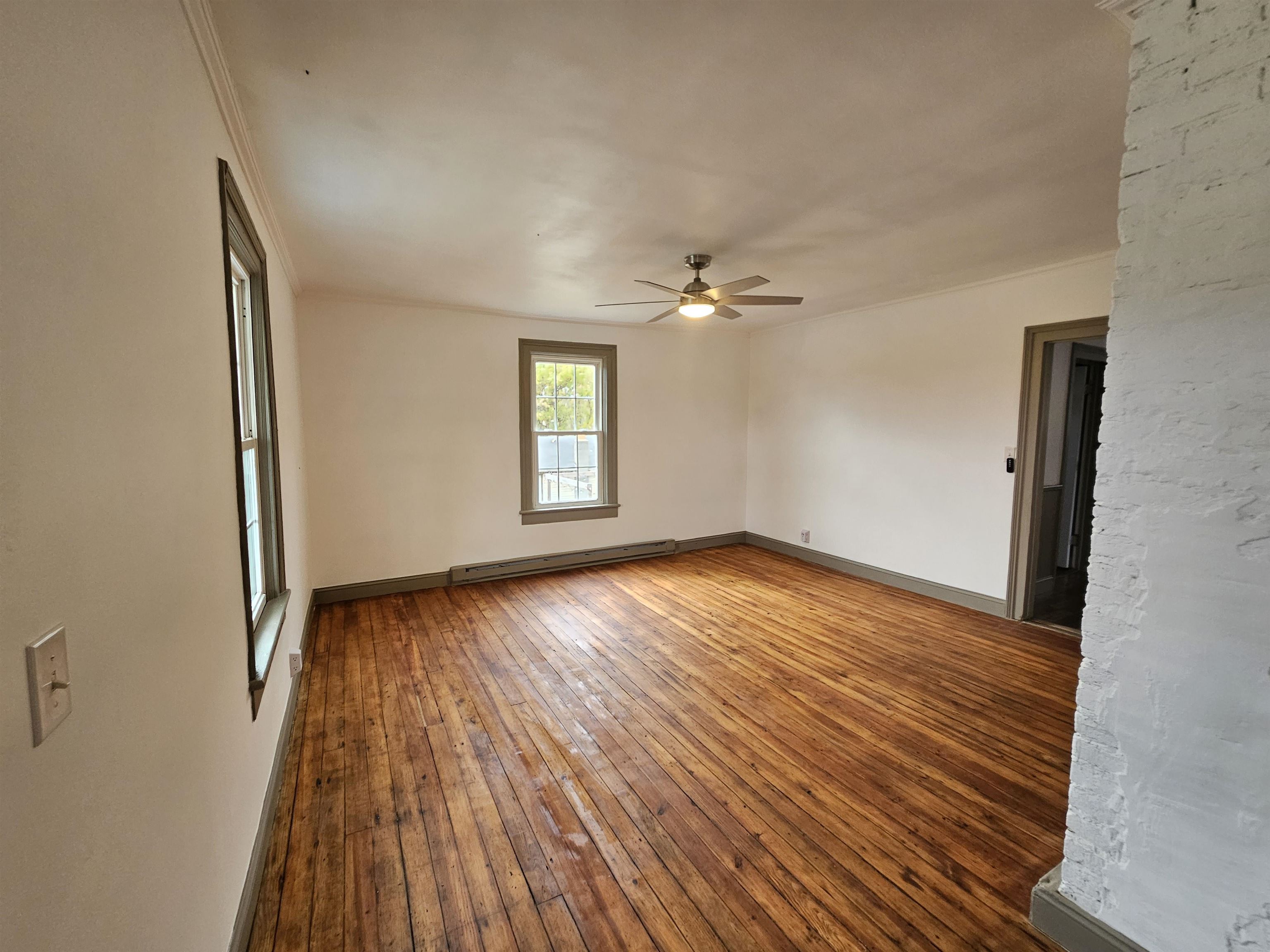 97 Mule Academy Road Fishersville, VA 22939 - Photo 5 of 15 wooden floor in an empty room with a window