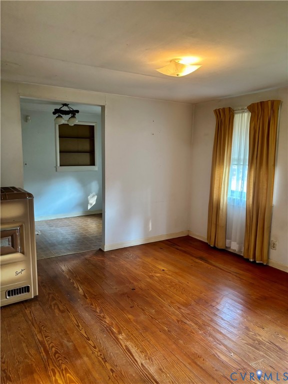 3485 Jefferson Landing Road Powhatan, VA 23139 - Photo 7 of 15 Spare room featuring hardwood / wood-style floorin