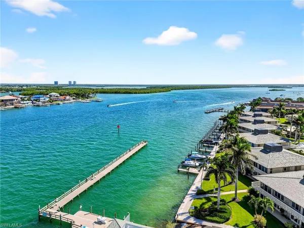 a view of a lake with a big yard