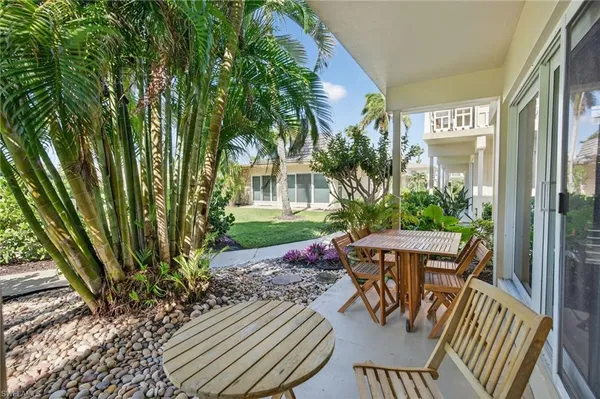 a view of outdoor dining space with a patio