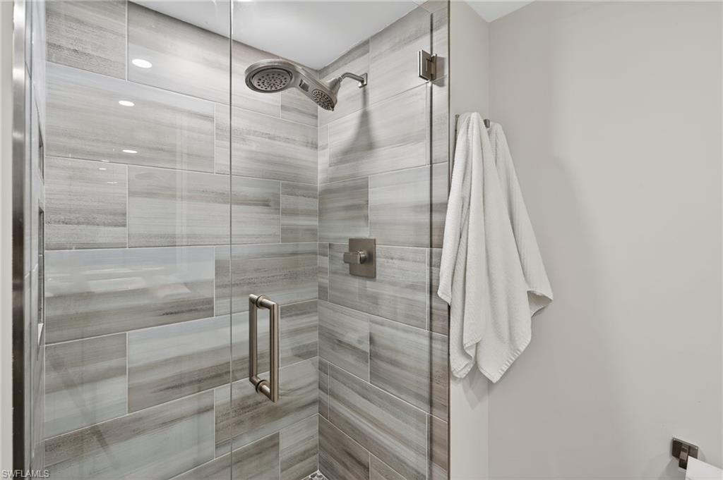 1215 Edington Place, Unit A2 Marco Island, FL 34145 - Photo 15 of 29 a bathroom with a shower