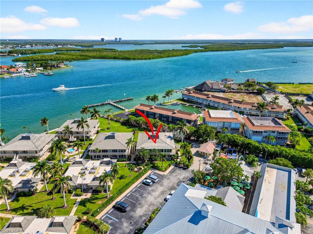 1215 Edington Place, Unit A2 Marco Island, FL 34145 - Photo 2 of 29 an aerial view of tennis court