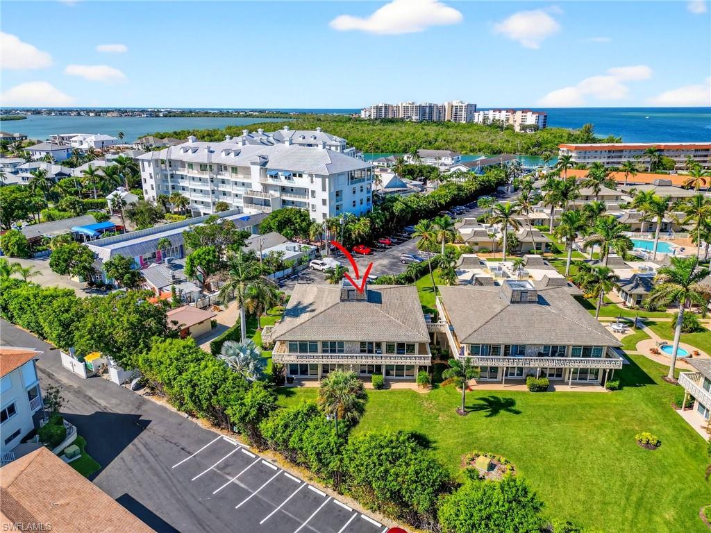 1215 Edington Place, Unit A2 Marco Island, FL 34145 - Photo 5 of 29 an aerial view of a house with a garden view
