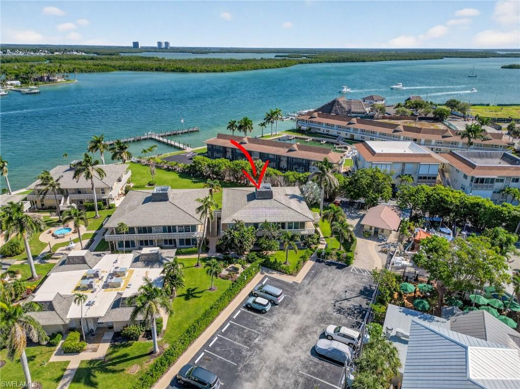 1215 Edington Place, Unit A2 Marco Island, FL 34145 - Photo 9 of 29 an aerial view of residential houses with outdoor space