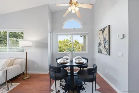 a view of a dining room with furniture window and outside view