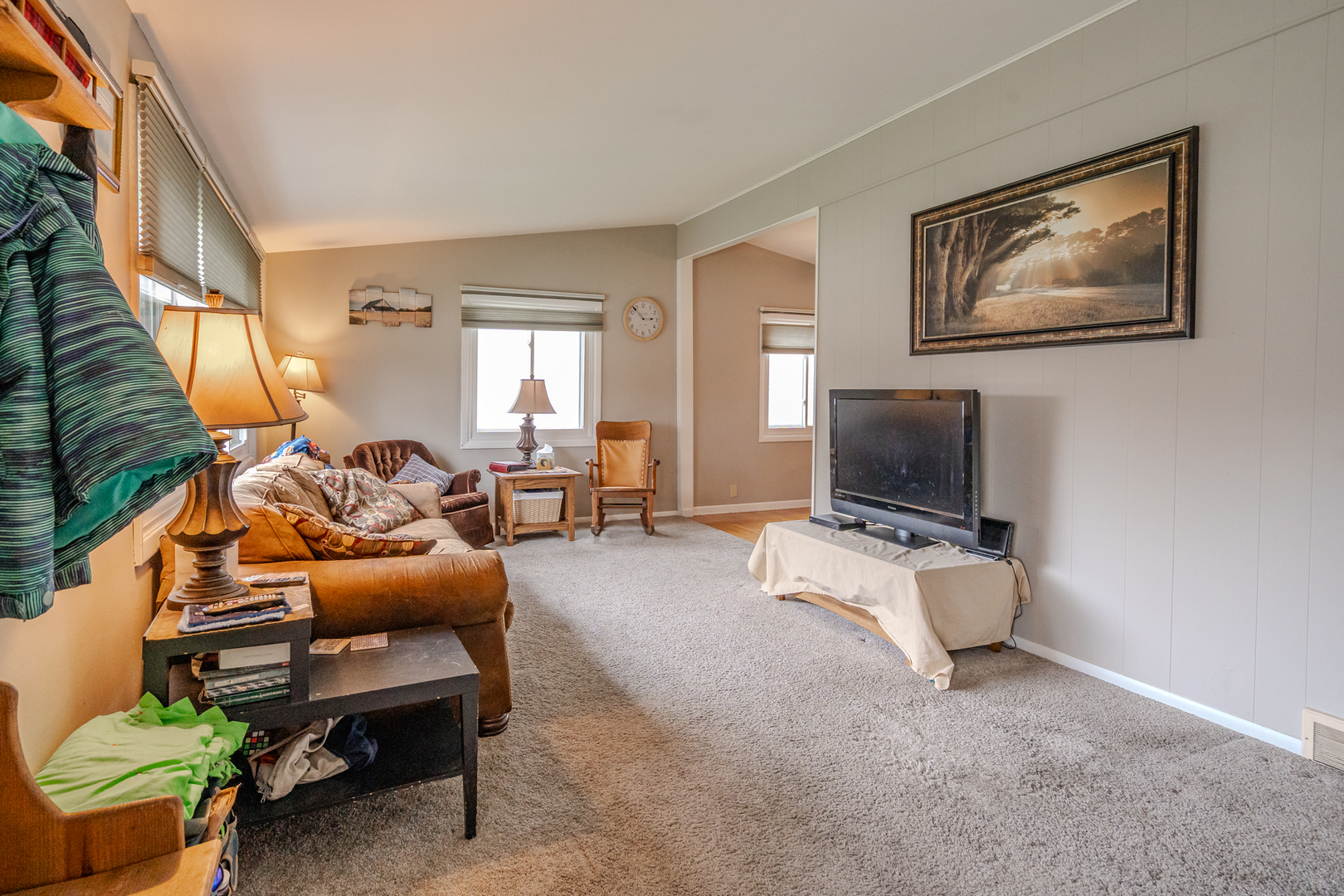 808 Bryan Street Normal, IL 61761 - Photo 8 of 20 a living room with furniture and a flat screen tv