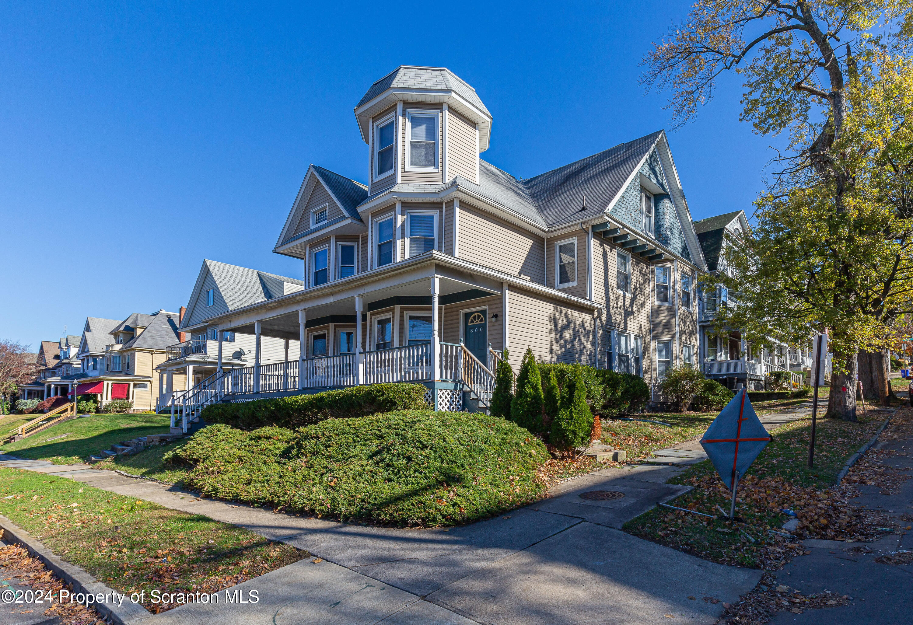 800 Quincy Avenue Scranton, PA 18510 - Photo 19 of 23 a front view of a house with a garden and plants