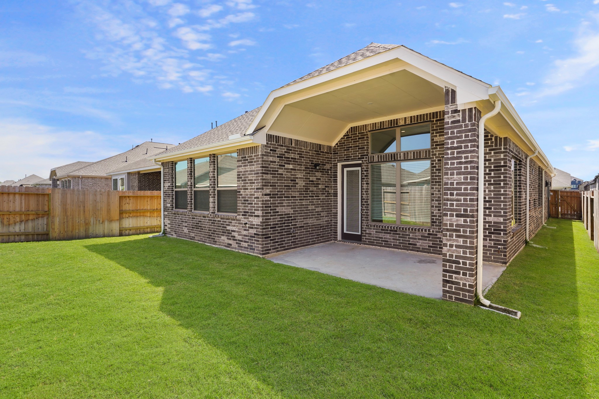 515 Tawny Rim Drive Willis, TX 77318 - Photo 12 of 22 a front view of a house with a garden
