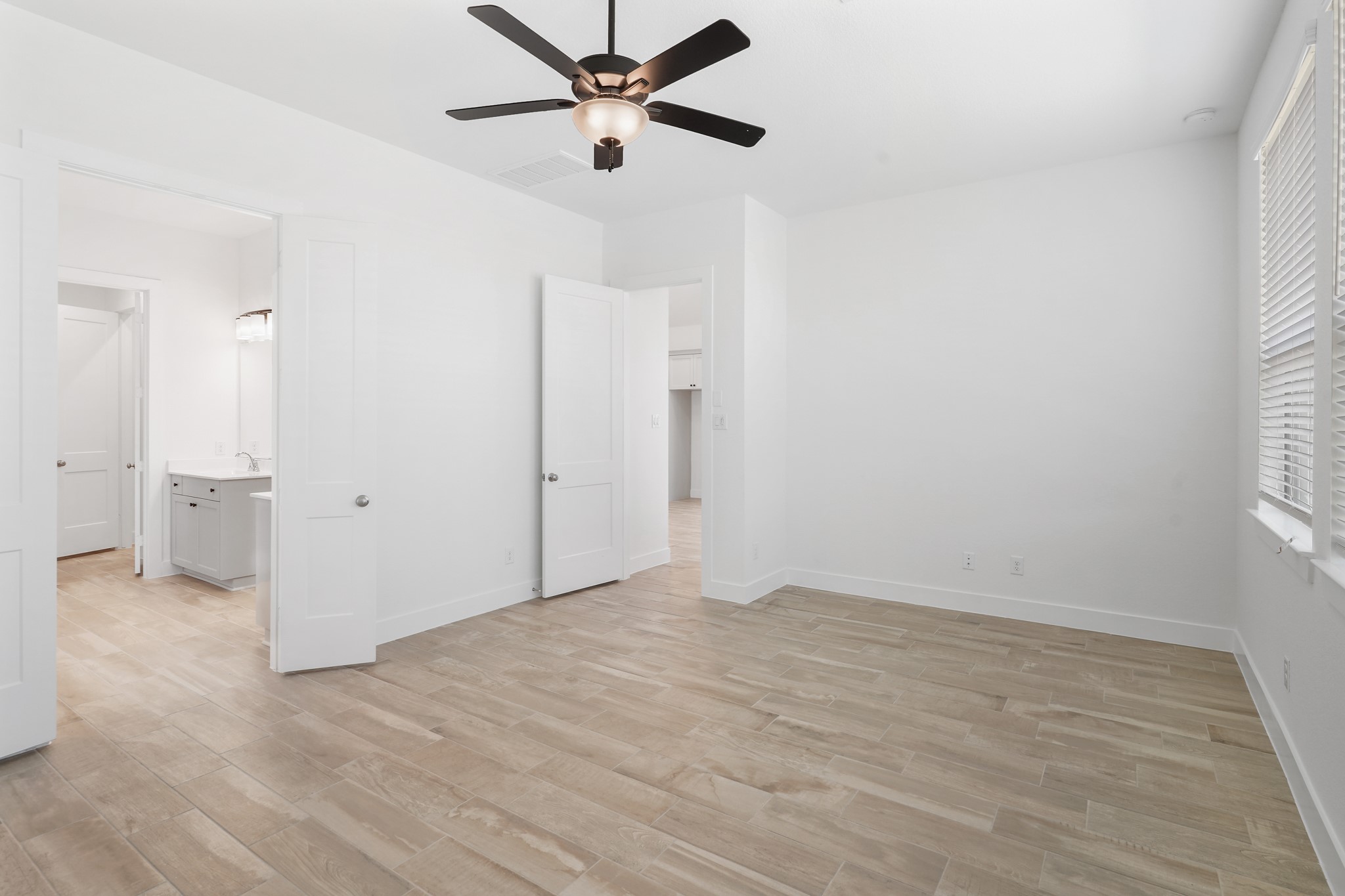 515 Tawny Rim Drive Willis, TX 77318 - Photo 4 of 22 wooden floor in an empty room