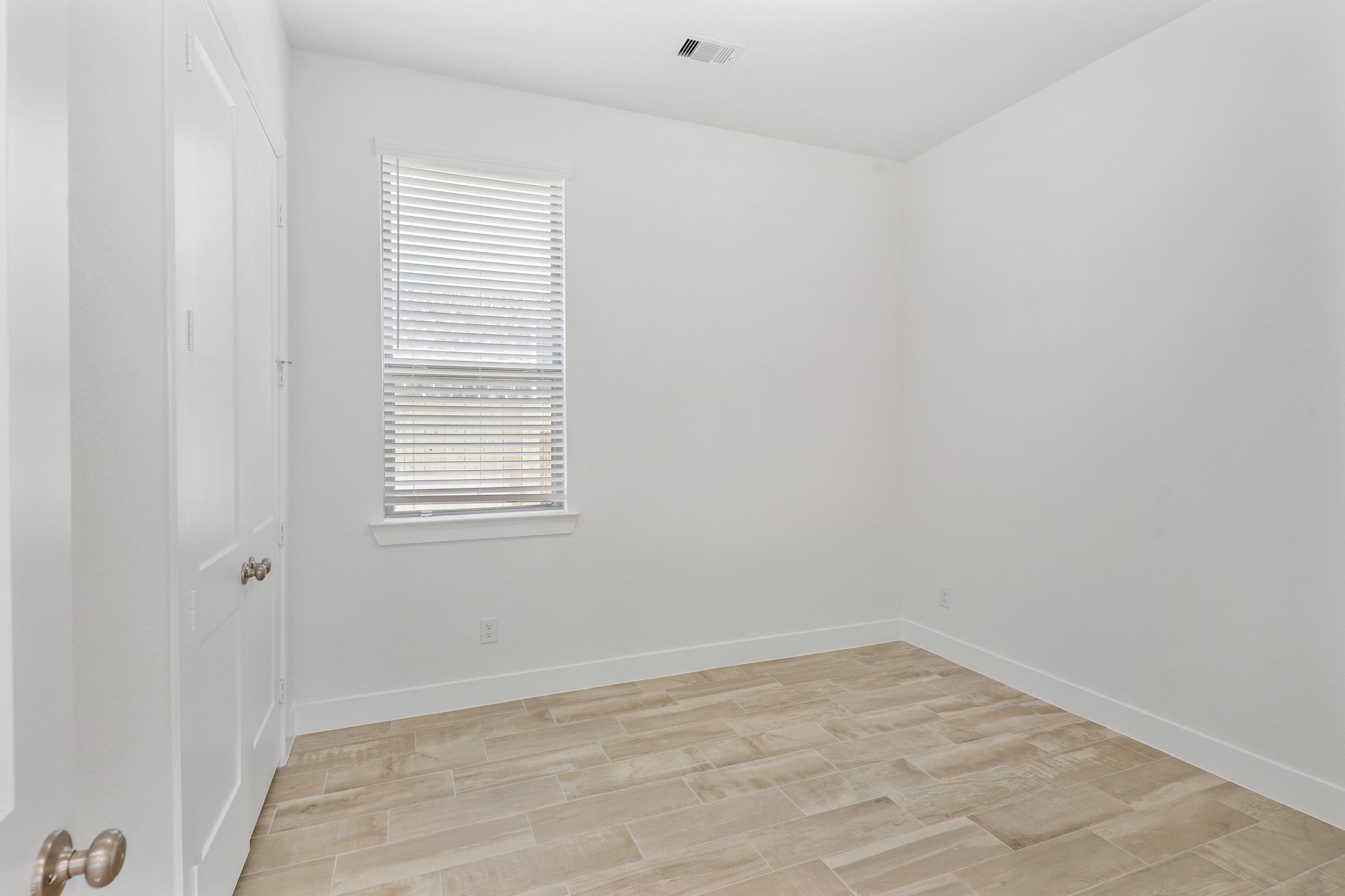 515 Tawny Rim Drive Willis, TX 77318 - Photo 10 of 22 a view of a room that has a window in it