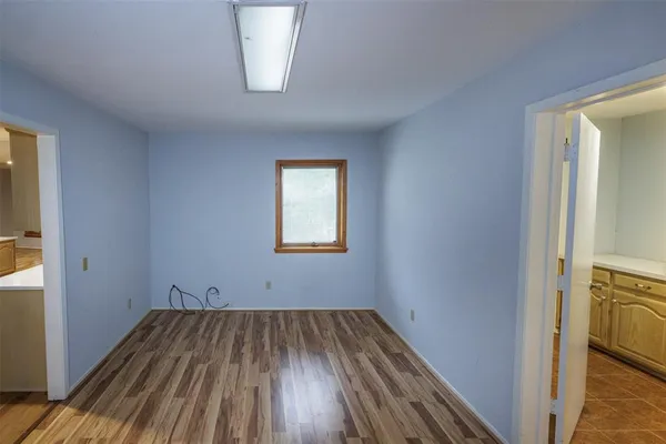 a bathroom with a toilet and a sink