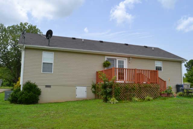 2580 Black Road Prospect, TN 38477 - Photo 2 of 7 a front view of a house with a yard