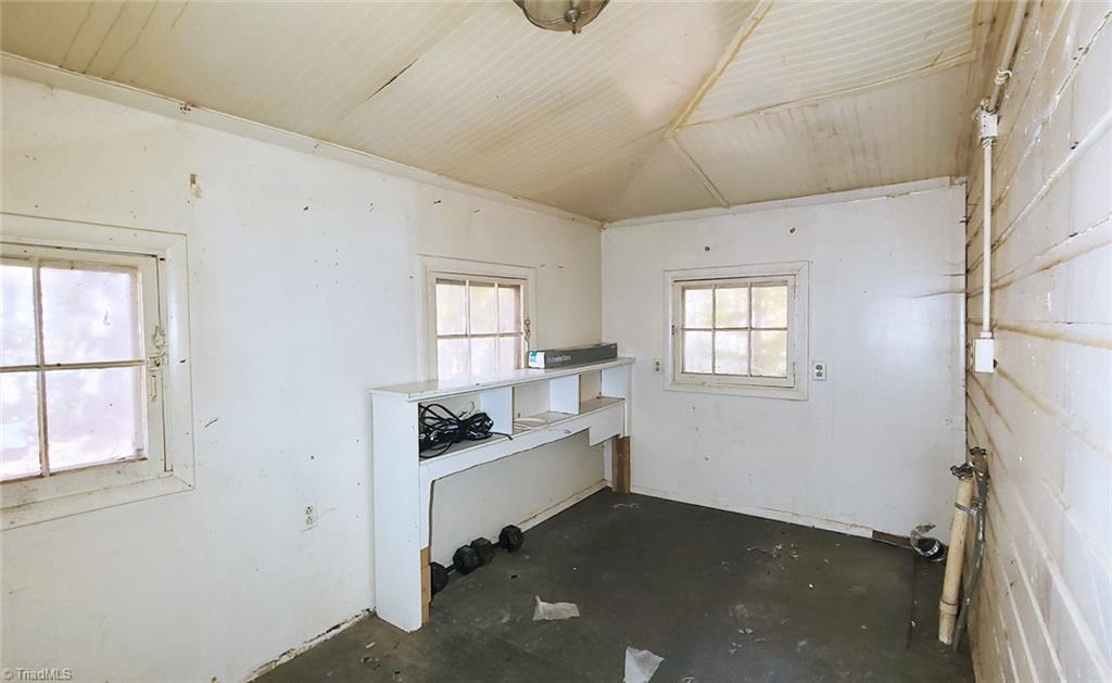 9251 Weigh Station Road Rural Hall, NC 27045 - Photo 25 of 37 Laundry room; kitchen on the right.