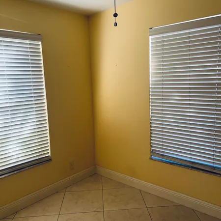 a view of a street with a building
