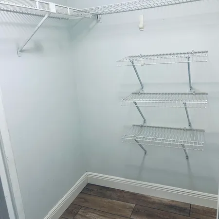 a view of a room with a window