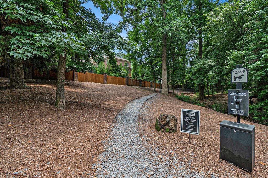 3235 Roswell Road, Unit 818 Atlanta, GA 30305 - Photo 23 of 24 a view of a backyard with sitting area
