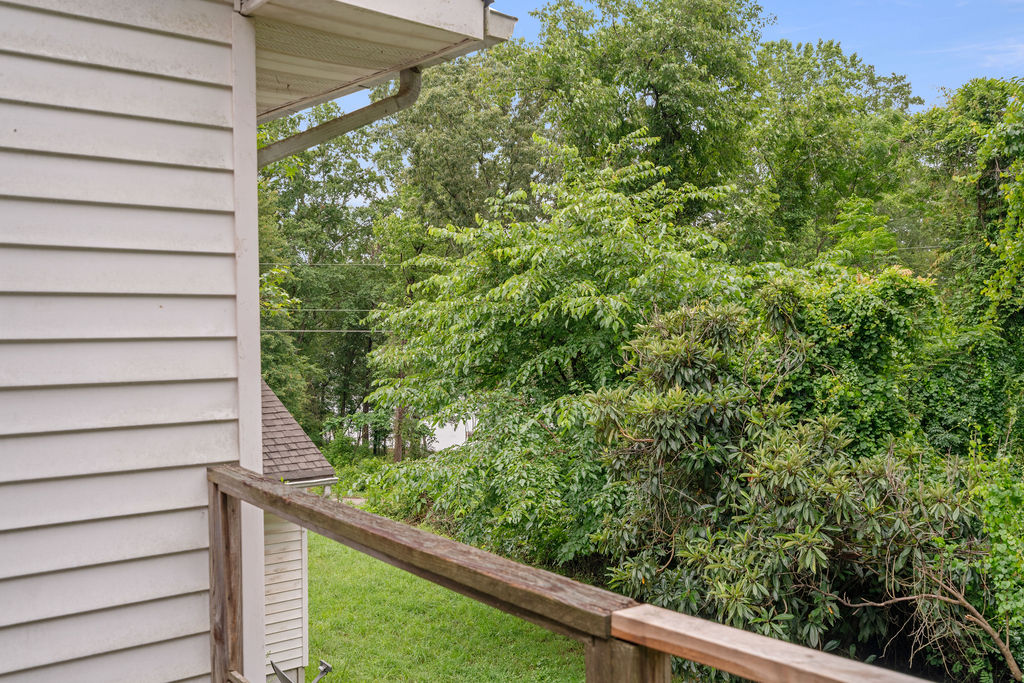 712 Whitney Way Anderson, SC 29625 - Photo 29 of 31 A tranquil view of verdant foliage from an elevated outdoor space.
