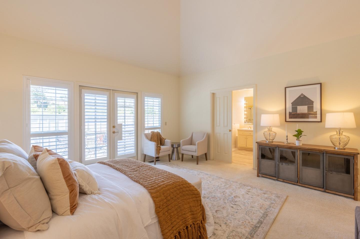14440 Mountain Quail Road Salinas, CA 93908 - Photo 21 of 30 a spacious bedroom with a bed and a couch