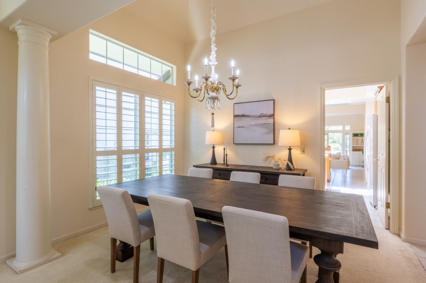 14440 Mountain Quail Road Salinas, CA 93908 - Photo 8 of 30 a view of a dining room with furniture and chandelier