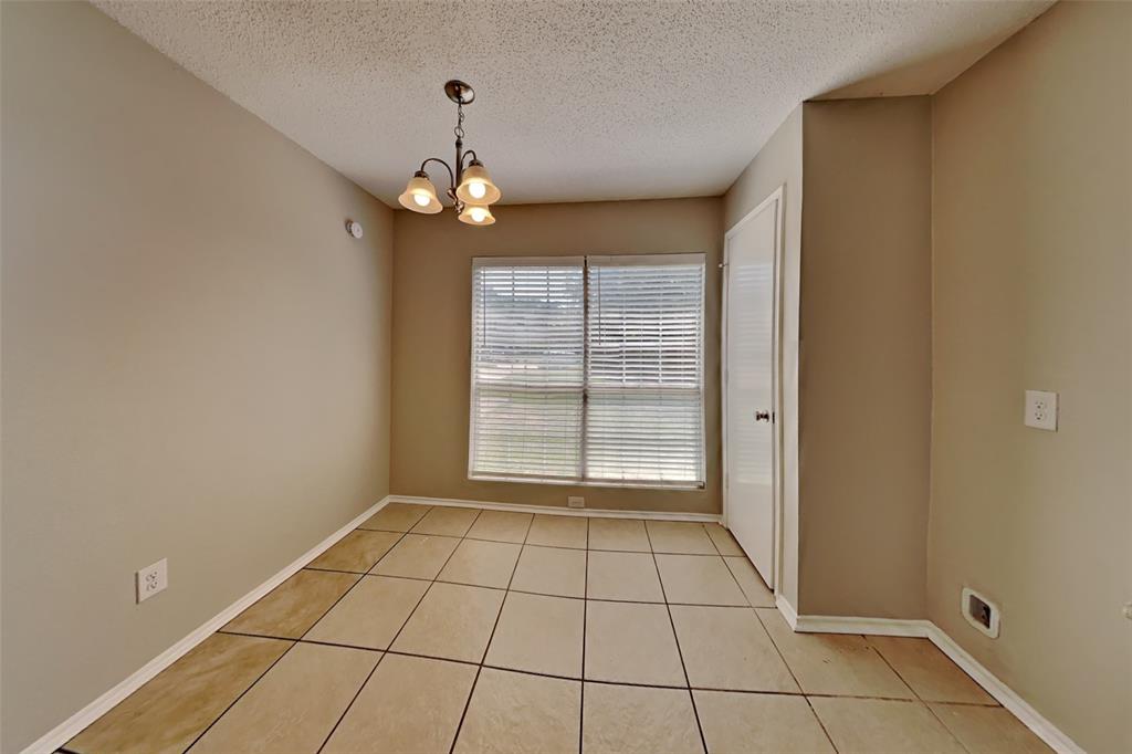 4605 Greenfern Lane Fort Worth, TX 76137 - Photo 6 of 18 a view of an empty room with a window