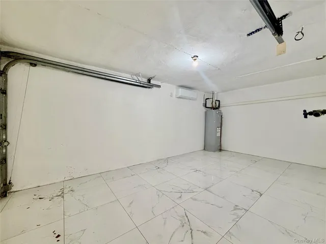 a view of a room with white walls