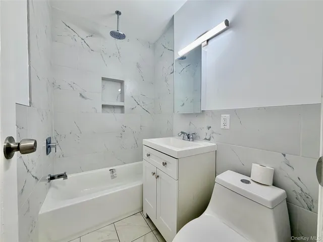 a view of a bathroom with a sink and a toilet