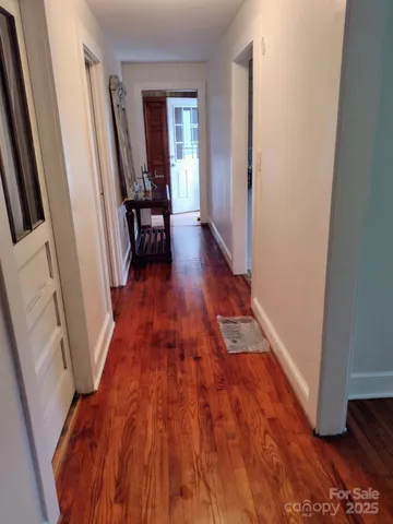 a living room with furniture rug and window
